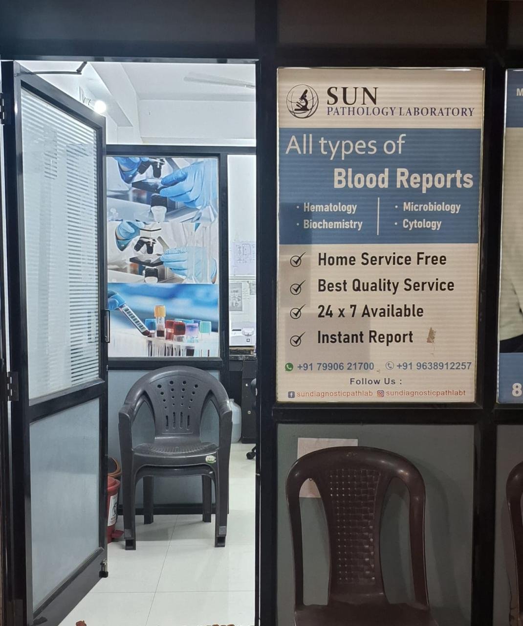 Inside Sun Pathology Laboratory — entrance and microscope mural